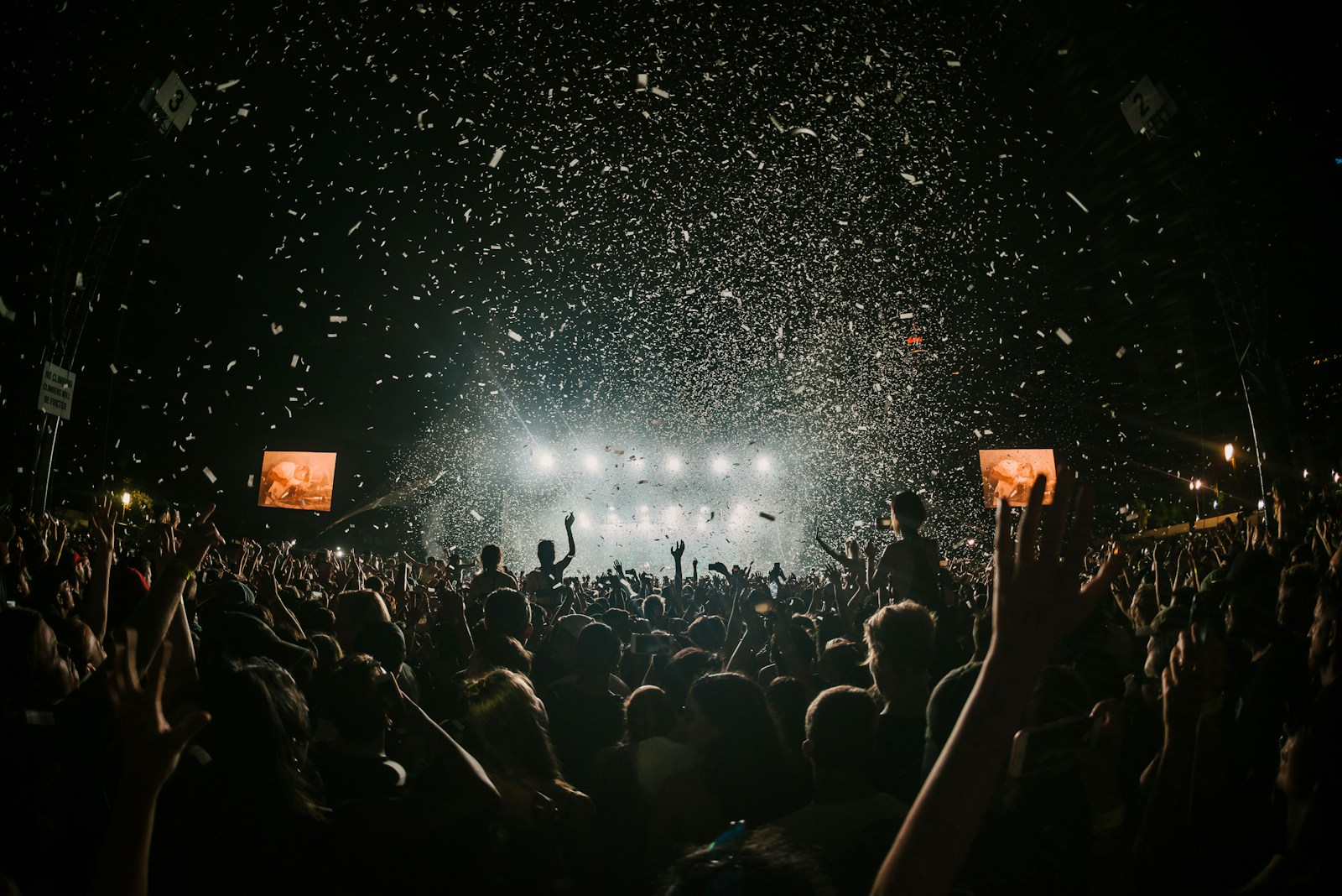 Festival lights and a crowd celebrating